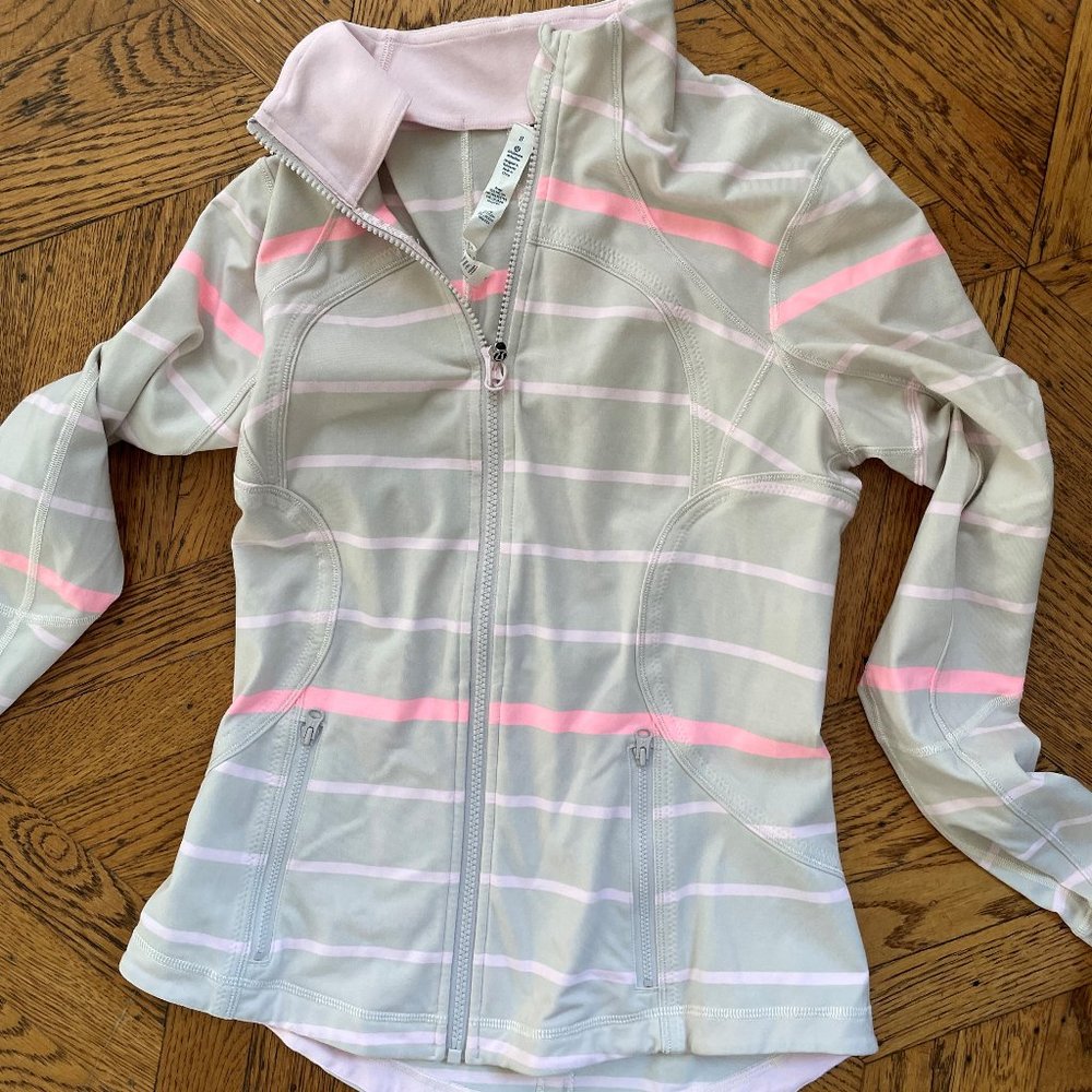 Lulu Lemon running jacket/ runs small in strips